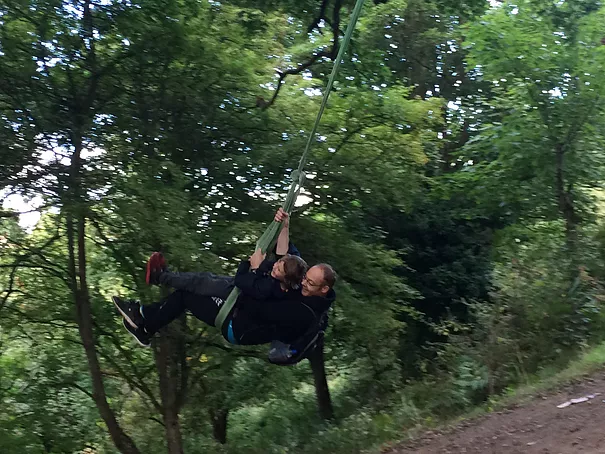 Rope swing in the woods